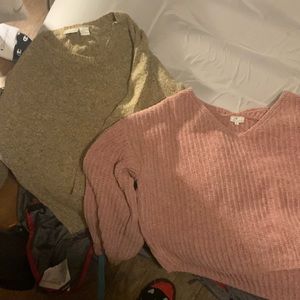 2 woman sweaters